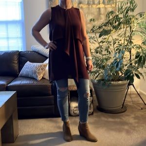 Long layered sleeveless wine colored blouse
